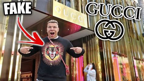 WEARING FAKE GUCCI TO THE GUCCI STORE PRANK!